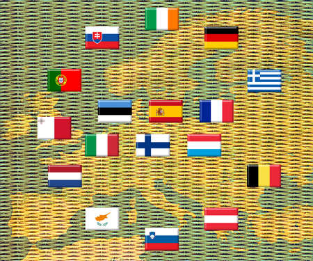 Flags of eurozone countries against piles of metal coinsの写真素材