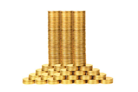 Coins from yellow metal on a white backgroundの写真素材