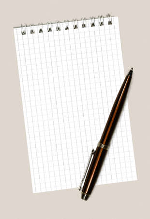 Notebook and pen on a white backgroundの写真素材