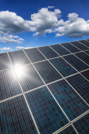 Reflection of the summer sun on solar panels