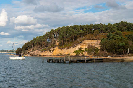 View across the harbour to the to Pottery Pier on Brownsea Island