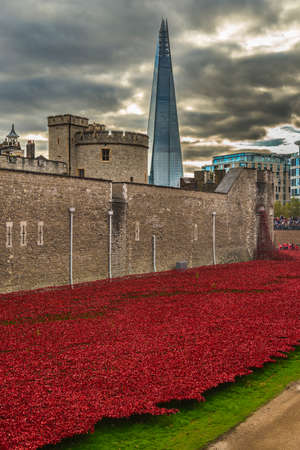 Tower of London and art installation - Blood Swept Lands and Seas of Red sees 888,246 ceramic poppies planted in the Towerのeditorial素材