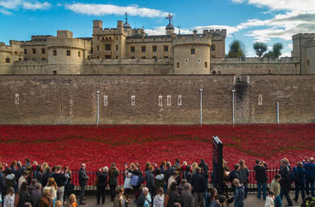 Tower of London and art installation - Blood Swept Lands and Seas of Red sees 888,246 ceramic poppies planted in the Towerのeditorial素材