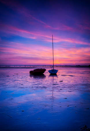 The setting sun illuminates the scene in one of the most beautiful areas of Dorsetの写真素材