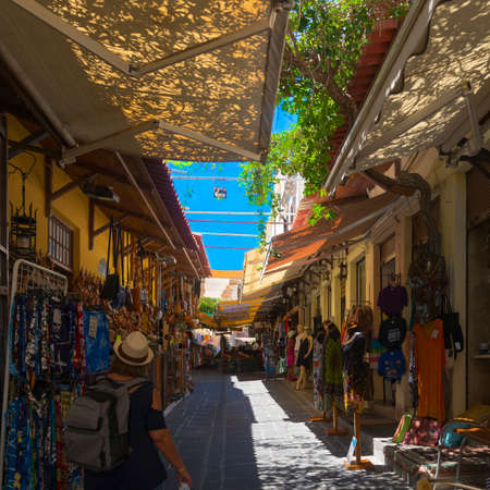 Tourists wander the streets of the old town of Rhodes