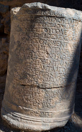 Greek writing on stones at the Lindos Acropolisの写真素材