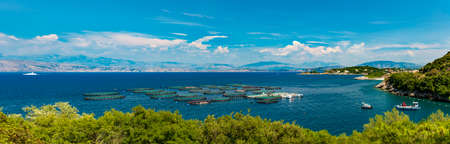Aquaculture of fish off the shores of Corfuの写真素材