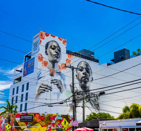 Miami, United States - July 29, 2019: Huge wall paintings adorn abandoned warehouses, stores and...