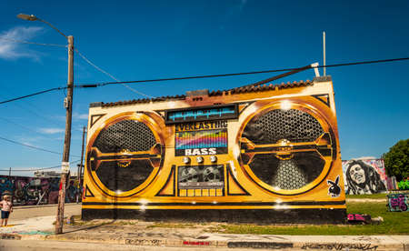 Miami, United States - July 29, 2019: Huge wall paintings adorn abandoned warehouses, stores and...