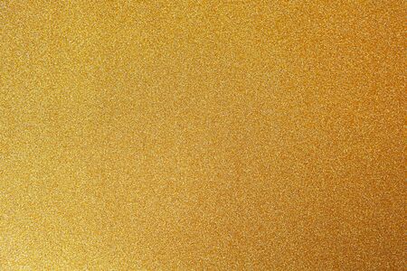Gold festive backgrond, close-up. Copy space for text. Horizontal. Celebration, holidays, sales, fashion concept, harvesting for mock up.の写真素材