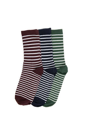 Striped multicolored socks, dark green, burgundy, blue, isolated on white background, flatly, minimal style. Concept male clothing, housekeeping, sorting, decluttering, organizing.の写真素材