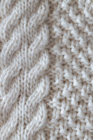Background from beautiful, knitted background, Aran pattern, weave from braids. Concept handicrafts,...