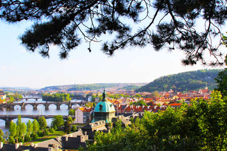 Prague - skyline with Vltava River bridges, Old Town towers, Smichov Quarter and Charles Bridgeの写真素材