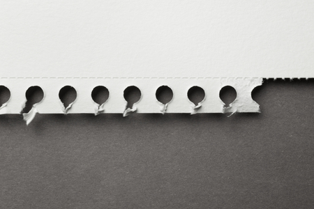 Piece of a ripped page from the sketch book, isolated on grayの写真素材