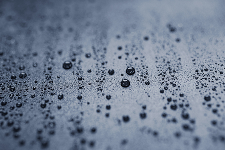 Water drops on a rough surfaceの写真素材