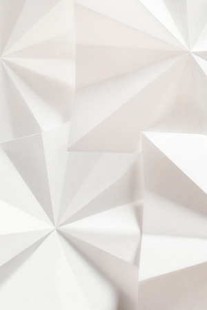 Abstract geometric of paper sheets folded, white backgroundの写真素材