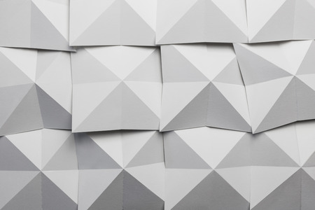 Composition of cards folded in geometric shapes,  abstract backgroundの写真素材