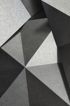 Geometric shapes of silvery paper, grainy textureの写真素材