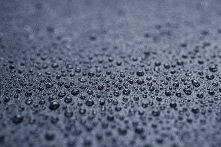 Water drops on a rough surfaceの写真素材