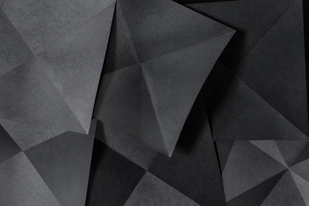 Geometric shapes of paper; grey backgroundの写真素材