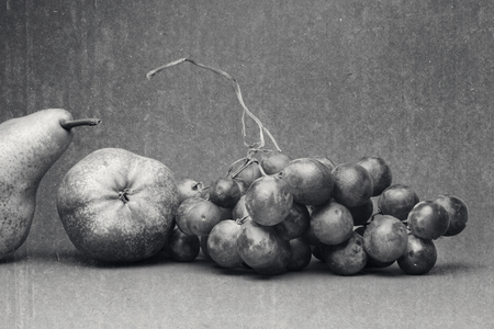 Black and white, still life with autumn fruitの写真素材
