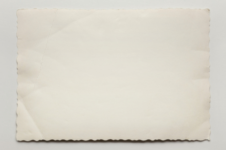 Vintage postcard isolated on gray backgroundの写真素材