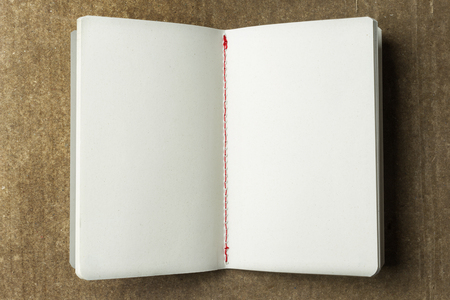 Blank book with pages of recycled paper texture for backgroundの写真素材