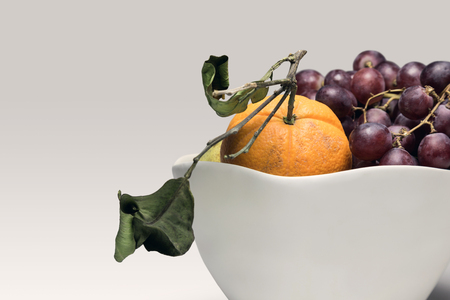 Ripe fruit in a vase of ceramicの写真素材
