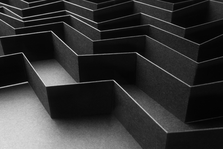 Black and white abstract background with stripes of paperの写真素材