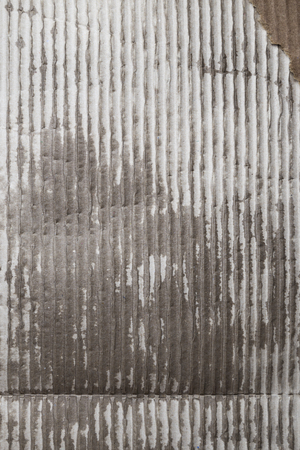 Wet corrugated cardboard sheet, background textureの写真素材