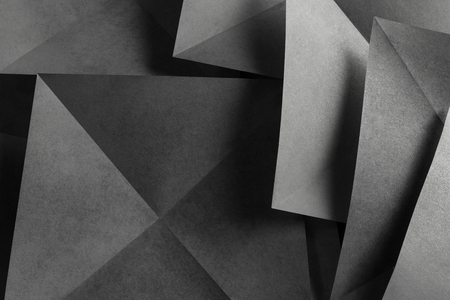 Geometric shapes of paper, abstract background	の写真素材