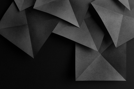 Geometric shapes of paper, abstract background	の写真素材