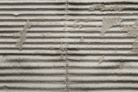 Gray striped old corrugated cardboard, backgroundの写真素材