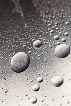 Big drops of water with droplets, abstract backgroundの写真素材