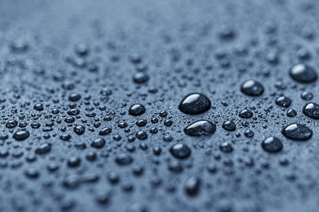 Water drops on a rough surfaceの写真素材