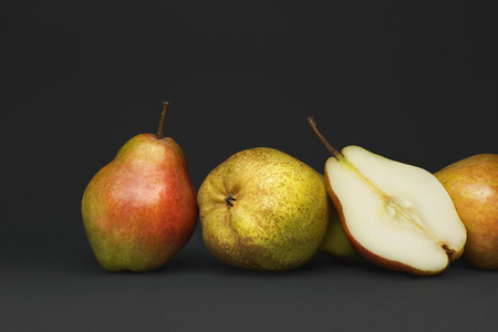 Still life with autumn fruit, pears isolated on grayの写真素材