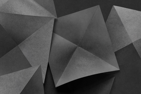 Abstract geometric of paper sheets folded in pyramidal shapesの写真素材