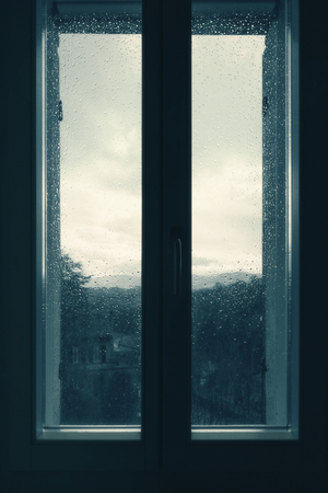 Bad weather, raindrops on the glassの写真素材
