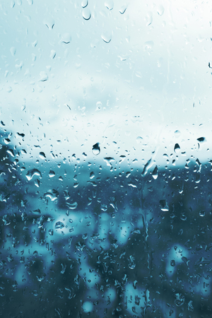 Bad weather, raindrops on the glassの写真素材