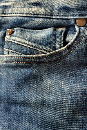 Closeup of blue jeans, empty pocketの写真素材