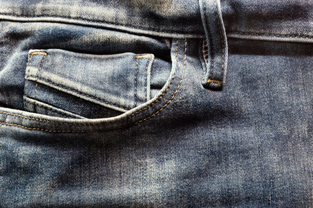 Closeup of blue jeans, empty pocketの写真素材