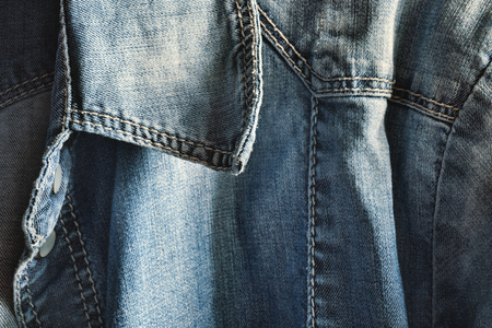 Collar of a jeans shirt, denim textureの写真素材