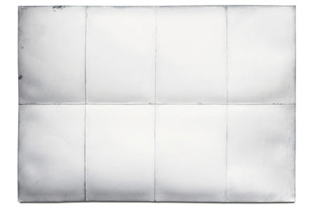 Sheet of paper folded in eight, isolated on white backgroundの写真素材
