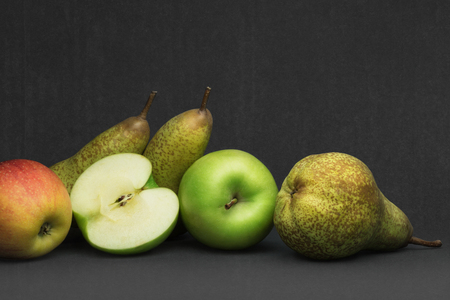 Autumn fruit, pears and apples isolated on gray backgroundの写真素材