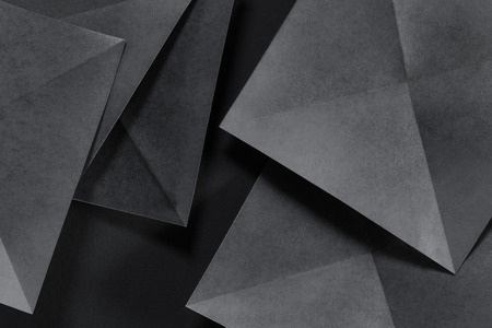 Geometric shapes of paper, grey backgroundの写真素材