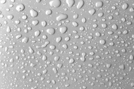 Surface with water drops, gray backgroundの写真素材