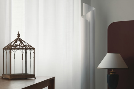 Interior of house, detail of the living room with lamps and curtainsの写真素材