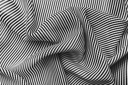 Elegant black and white silk with stripes, abstract backgroundの写真素材