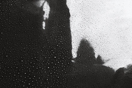 Water drops in black and white, abstract backgroundの写真素材