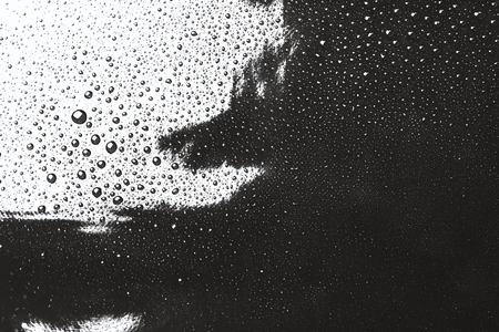 Water drops in black and white, abstract backgroundの写真素材